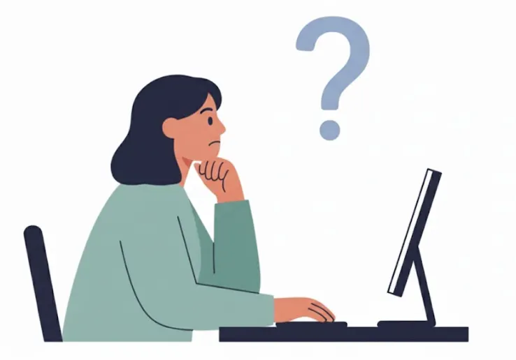 Illustration of a thoughtful designer at her computer with a question mark above her head.